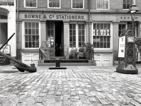 Established by Robert Bowne in 1775, Bowne Stationers grew as a financial printer throughout the 19th and 20th centuries. In 1975, Bowne & Co. Inc. partnered with South Street Seaport Museum to open a 19th-century-style print shop at 211 Water Street in the historic Seaport district.
